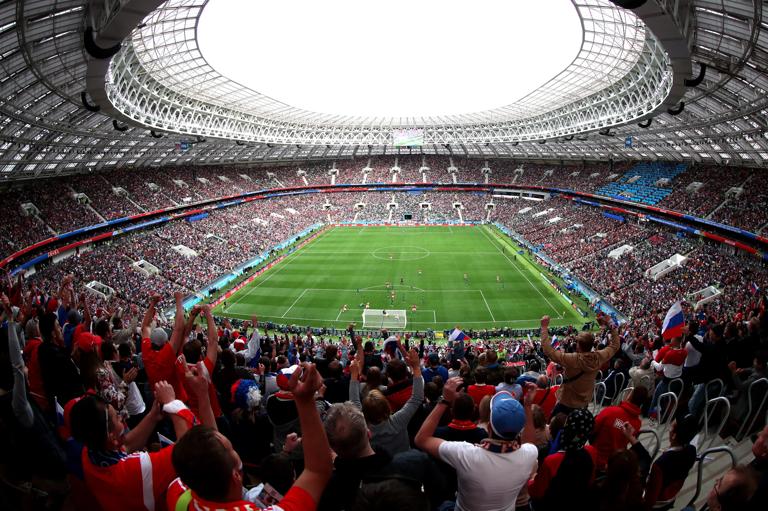 MOSCOW, RUSSIA - JUNE 14: General view of the stadium as fans celebrate the opening goal scored by Iury Gazinsky of Russia during the 2018 FIFA World Cup Russia Group A match between Russia and Saudi Arabia at Luzhniki Stadium on June 14, 2018 in Moscow, Russia. (Photo by Clive Rose/Getty Images)