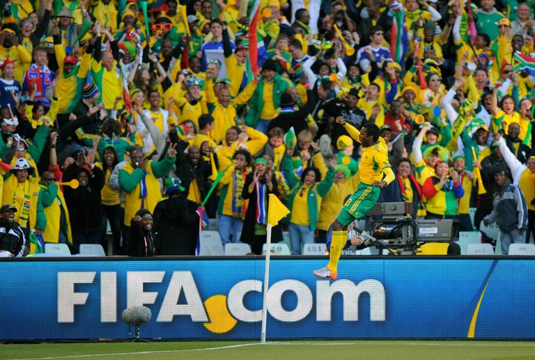 Bongani Khumalo of South Africa celebrates after scoring a goal to make it 1-0 (Photo by AMA/Corbis via Getty Images)