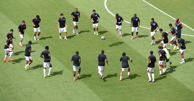 Costa Rica's players warm up prior to a Group D football match between Italy and Costa Rica at the Pernambuco Arena in Recife during the 2014 FIFA World Cup on June 20, 2014. AFP PHOTO / JAVIER SORIANO (Photo credit should read JAVIER SORIANO/AFP via Getty Images)