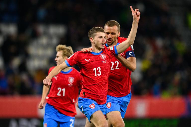 Czech Republic's defender #13 David Doudera celebrates with Czech Republic's midfielder #22 Tomas Soucek scoring the opening goal during the FIFA World Cup 2026 European qualification Group L football match between Czech Republic and Gibraltar, in Olomuc on November 17, 2025. (Photo by Michal Cizek / AFP) (Photo by MICHAL CIZEK/AFP via Getty Images)