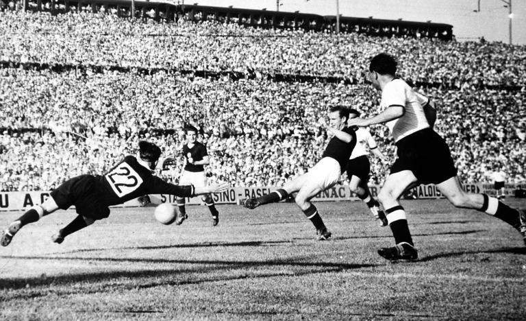 World Cup Finals, 1954, Basle, Switzerland, 20th June, 1954, Hungary 8 v Germany 3, Hungary's Budai shoots past German goalkeeper Turek to score during their Group two match  (Photo by Popperfoto via Getty Images/Getty Images)