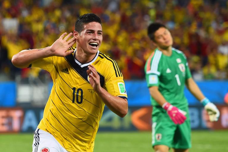 CUIABA, BRAZIL - JUNE 24: James Rodriguez of Colombia celebrates scoring his team's fourth goal past goalkeeper Eiji Kawashima of Japan during the 2014 FIFA World Cup Brazil Group C match between Japan and Colombia at Arena Pantanal on June 24, 2014 in Cuiaba, Brazil. (Photo by Christopher Lee/Getty Images)
