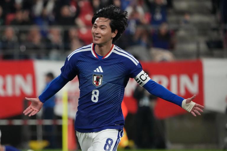 TOYOTA, JAPAN - NOVEMBER 14: Takumi Minamino of Japan celebrates the opener during the international friendly match between Japan and Ghana at Toyota Stadium on November 14, 2025 in Toyota, Aichi, Japan. (Photo by Kaz Photography/Getty Images)