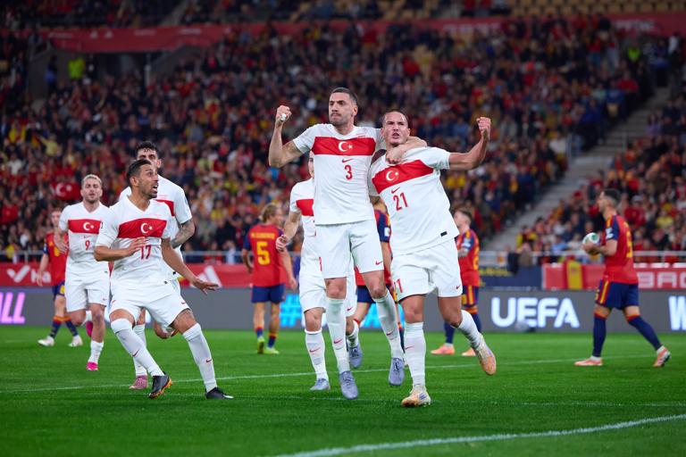 SEVILLE, SPAIN - NOVEMBER 18: Deniz Gul of Turkiye celebrates scoring his team's first goal with teammates during the FIFA World Cup 2026 qualifier match between Spain and T&Atilde;&frac14;rkiye at Estadio de La Cartuja on November 18, 2025 in Seville, Spain. (Photo by Fran Santiago - UEFA/UEFA via Getty Images)