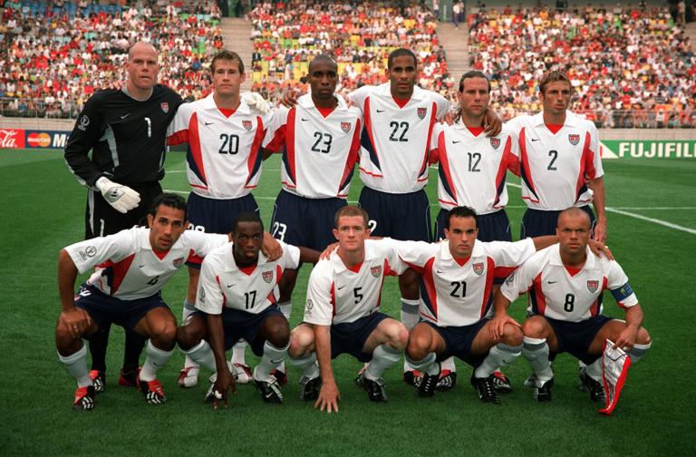 Credit: POPPERFOTO/JOHN MCDERMOTT, Football, 2002 FIFA World Cup Finals, Group D, Suwon, South Korea, 5th June 2002, USA 3 v Portugal 2, The USA team pose together for a group photograph prior to the match, Back Row L-R: Brad Friedel, Brian McBride, Eddie Pope, Tony Sanneh, Jeff Agoos, Frankie Hejduk, Front Row L-R: Pablo Mastroeni, DaMarcus Beasley, John O'Brien, Landon Donovan, and Earnie Stewart (Photo by Bob Thomas Sports Photography via Getty Images)